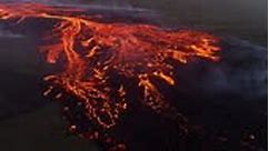 Branching lava stream from volcano eruption in Iceland 2023, hot red...