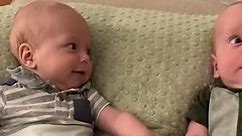 Magical moment two babies discover each other for first time