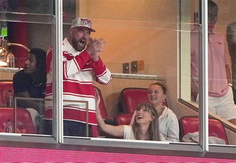 Taylor Swift wears engagement ring while cheering on Travis Kelce's ...