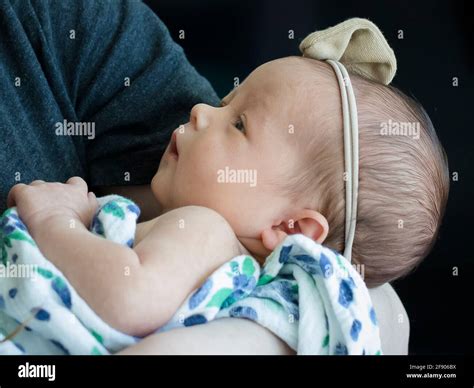 Woman cradling baby blanket hi-res stock photography and images - Alamy