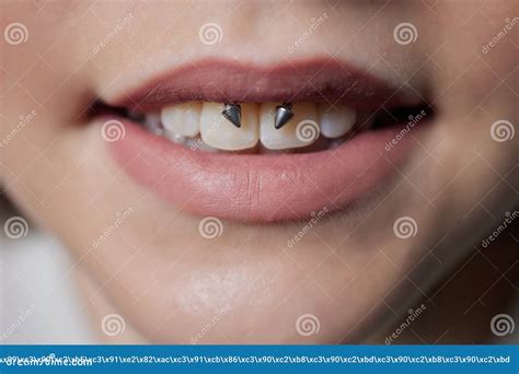 Smile or Frenulum Piercing Under the Upper Lip. Stock Image - Image of ...