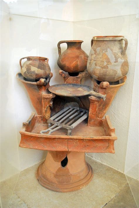 Ancient Greek Kitchen Oven and earthenware cooking utensils ...