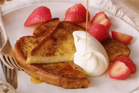 French toast with strawberries and syrup