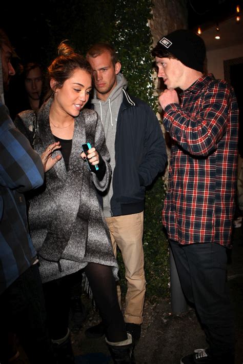 Celebrity Leaked Nude: Miley Cyrus Braless See-Through Black Top Candids