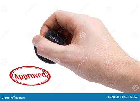 Rubber Stamp Making Seal On Contract. Red Stamp With Text Approved On ...