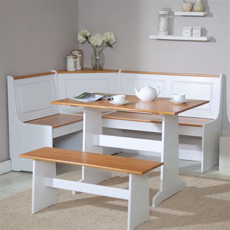 This three piece breakfast nook can help brighten up your space or fit ...