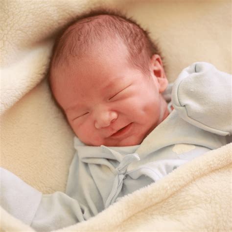 What Is The Spiritual Meaning Of Baby Laughing In Sleep? - On Your Journey