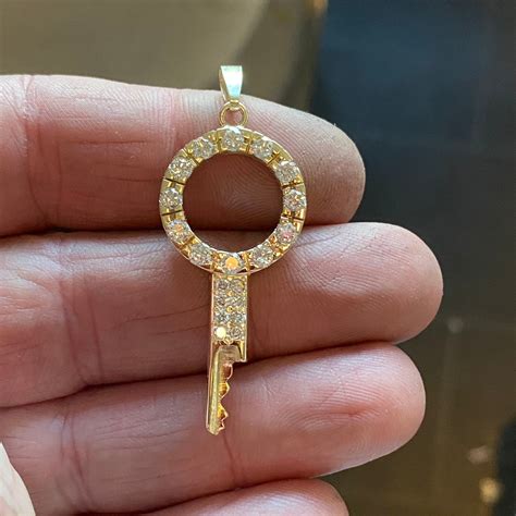 Timeless key | chastity key | chastity shop | gold chastity key ...