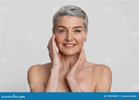Mature Beauty. Portrait Of Nude Beautiful Middle-Aged Woman Touching ...