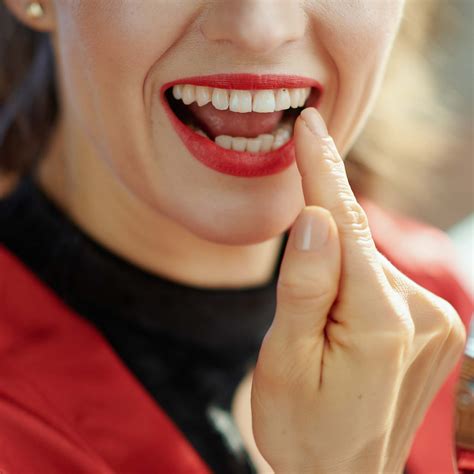 Small Black Dot In Mouth Near Tooth