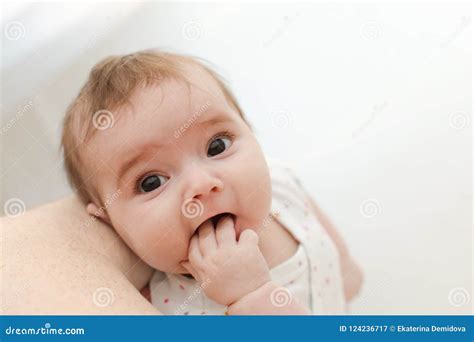 Lovely baby sucking hand stock image. Image of funny - 124236717