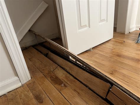 Hardwood floor buckling : r/Flooring