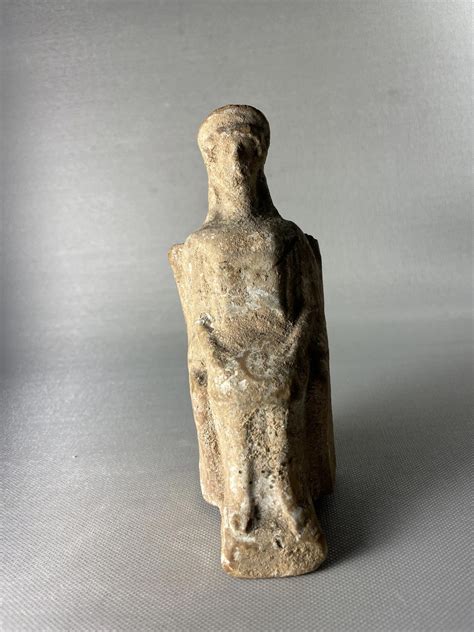 Votive Statuette, Hollow, of a Female Seated on a Square Chair in Stiff ...