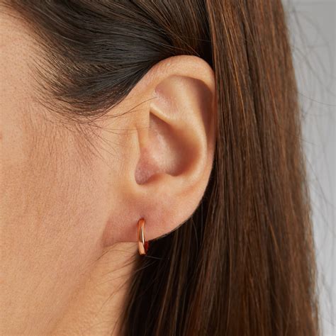 Goldsmiths 9ct Rose Gold Huggie Earrings 5.59.1789 | Goldsmiths