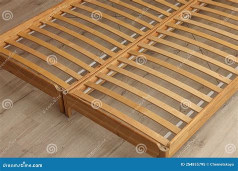 Wooden Bed Frame on Floor, Closeup View Stock Image - Image of relax ...