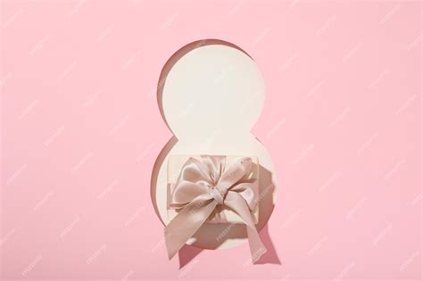 Premium Photo | Number eight cut out of paper with a gift