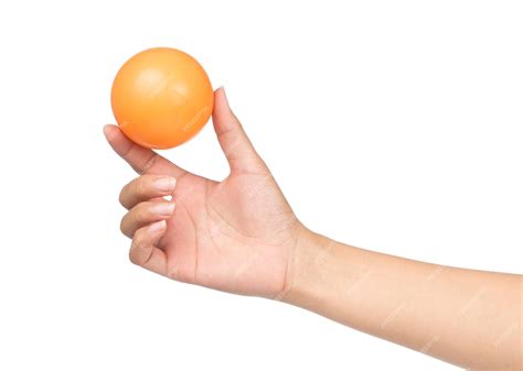 Premium Photo | Hand holding Plastic ball isolated on white background