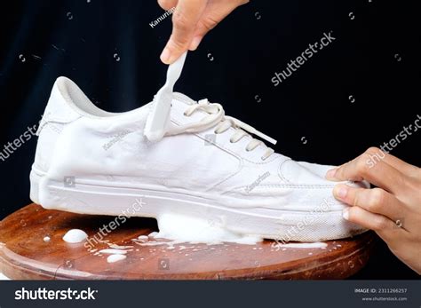Woman Cleaning White Leather Shoes Cleaning Stock Photo 2311266257 ...