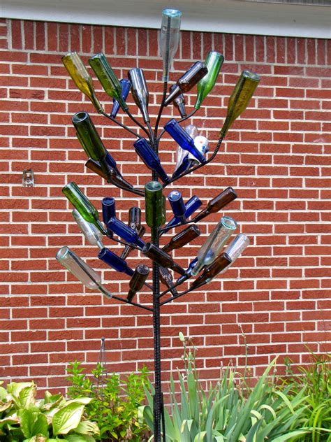 Bottle Tree Craft Idea | Colorful bottle tree art, Rebar wine bottle ...