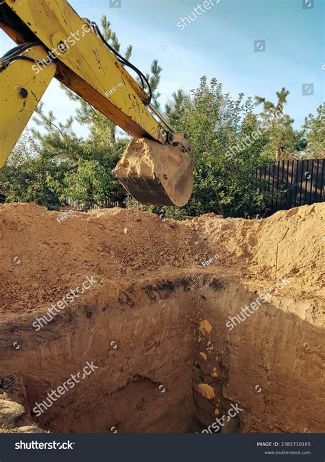 Excavator Digs Foundations Building Digging Pit Stock Photo 2382710105 | Shutterstock