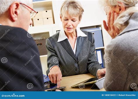 Consultant Calculates Finances for Seniors Stock Photo - Image of ...