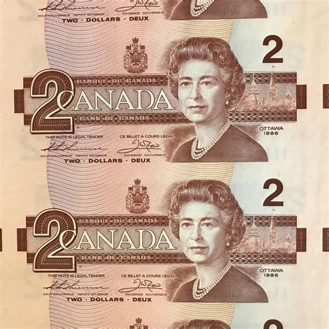 UNCUT SHEET OF 1986 CANADIAN $2 DOLLAR BILLS (UNCIRCULATED)