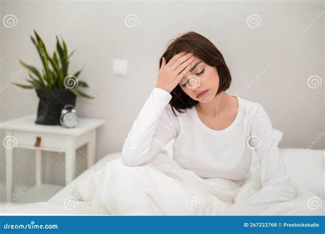 Tired Young Woman Waking Up with Headache in the Morning Stock Photo - Image of feverish ...