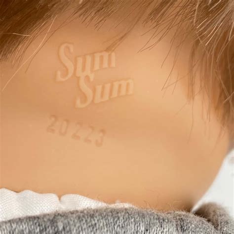Beautiful Sum Sum Down Syndrome Boy Doll 45 CM Light Brown Hair(s)