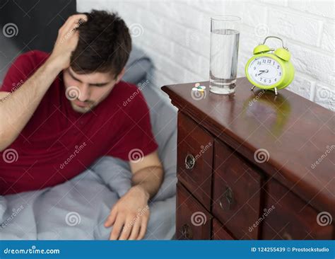 Man Wake Up with Headache Lying in Bed Stock Image - Image of despair, failure: 124255439