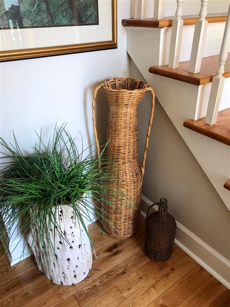 Tall Woven Rattan Floor Vase at Joyce Collins blog