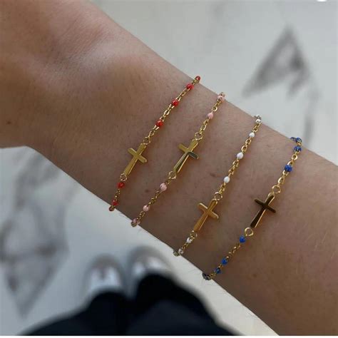 evry jewels pink cross bracelet - Depop