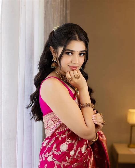 Krithi shetty gorgeous photos in red silk saree - glamsundari.in