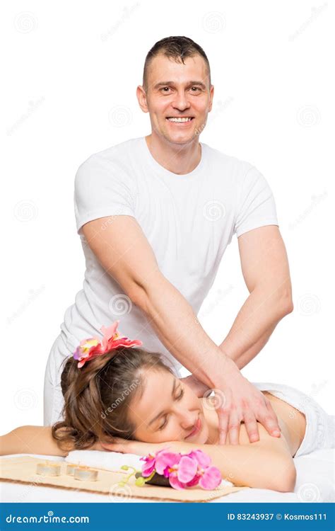 A Male Massage Therapist Doing An Elbow Massage To A Young Girl Stock ...