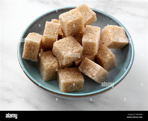 Brown sugar lumps demerara unrefined cane Stock Photo - Alamy