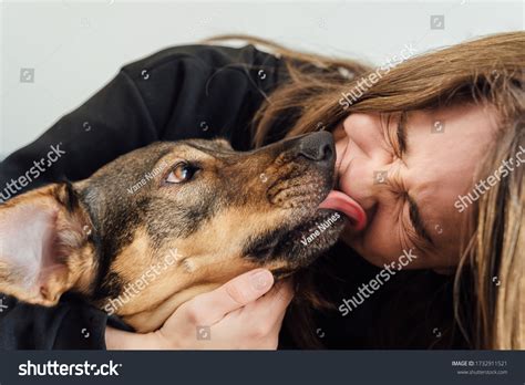 Dog Licks Dick