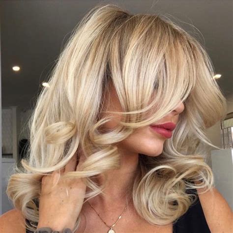 Blonde & bouncy. We're in love with these big, blow-dry curls by @teri ...
