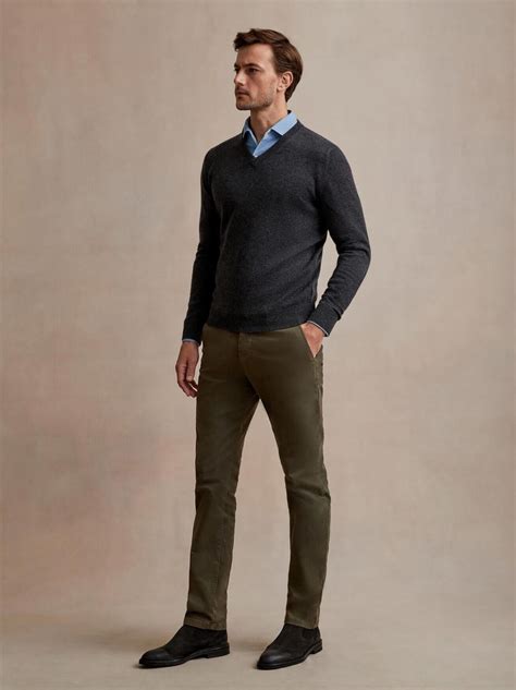 Modern office outfit for men with chinos, shirts and jumper with ...