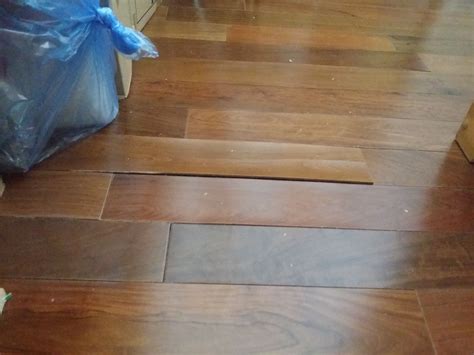 Pictured: "Cupping" wood floors. This is a sign your floors have been ...