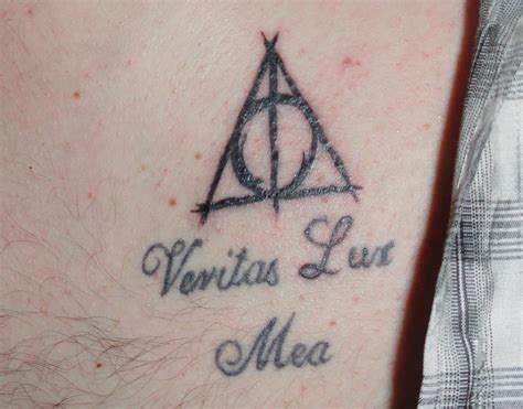 What Do Latin Phrase Tattoos Mean And Where Did They Come From?