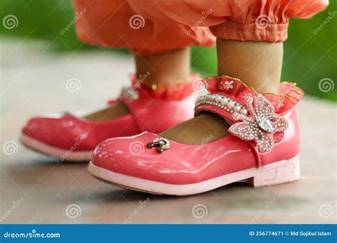 The Girl Wears Beautiful Pink Color Shoes with the Same Color Dress ...