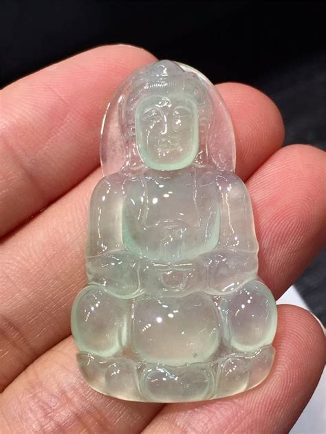 At Auction: A Chinese Carved Jadeite Buddha Pendant