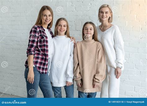 Portrait of Beautiful Lesbian Family in Casual Clothes, Two Mom`s and ...