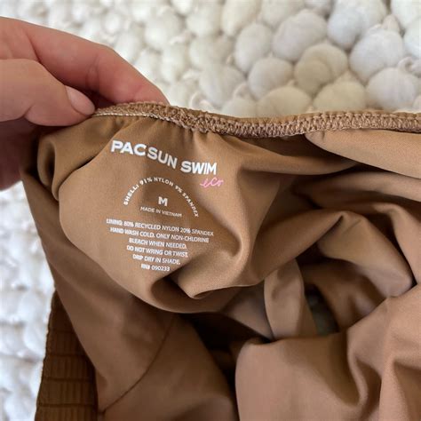 Brown ruched one piece swimsuit from pacsun. New... - Depop