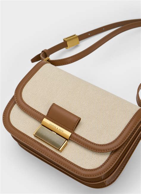 Chocolate Charlot Canvas Crossbody Bag - CHARLES & KEITH AU