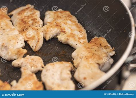 Sauteed Chicken Tenders in an Orange and Lemon Sauce Stock Photo ...