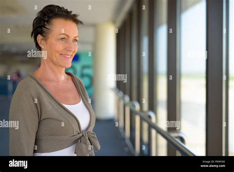 Beautiful mature woman smiling hi-res stock photography and images - Alamy