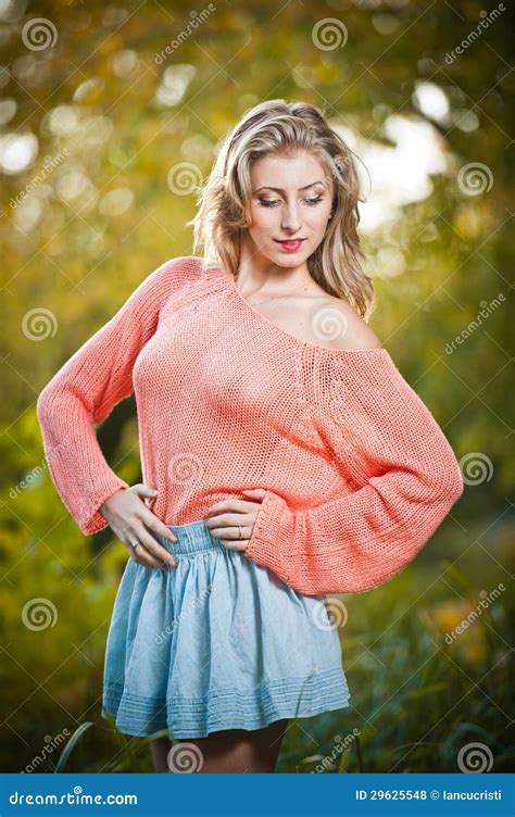 Beautiful Elegant Woman in Pink Sweater in Autumn Park . Stock Photo ...