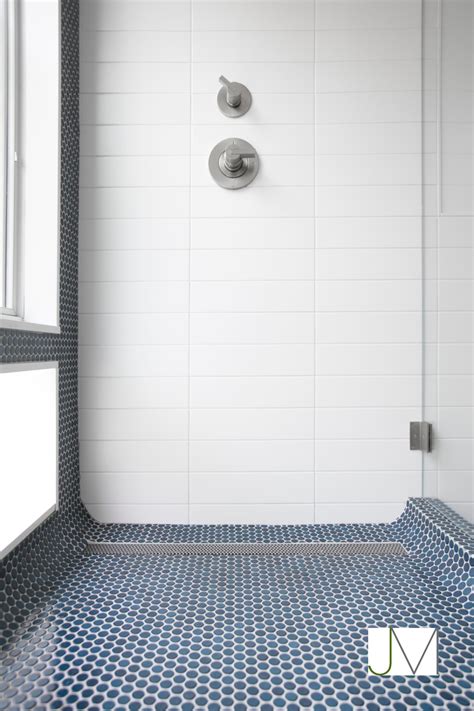 White Shower Wall with Navy Pennytile accent and floor tile | Small ...