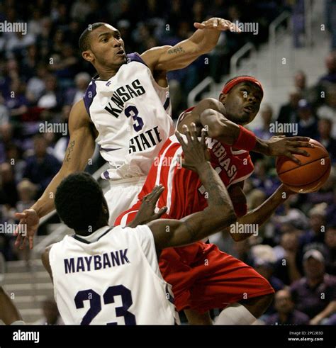 Nebraska guard Sek Henry (1) attempts to shoot past the defense of ...