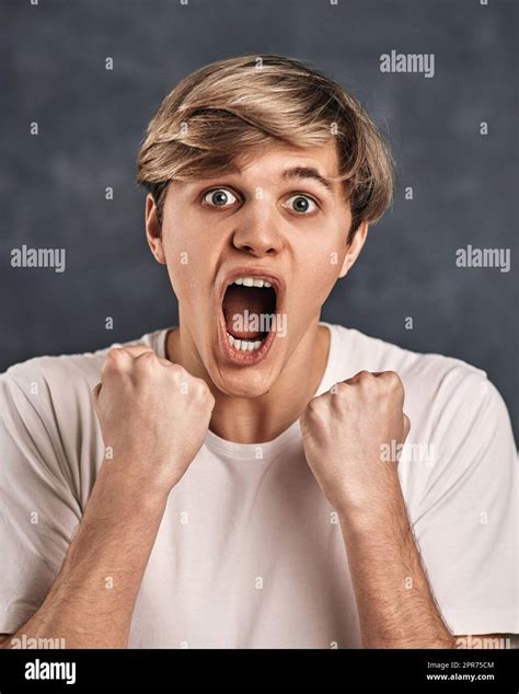Young man shouting angry hi-res stock photography and images - Alamy